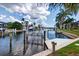 Picturesque waterfront view with a private boat dock, offering direct access to open water at 3800 Carupano Ct, Punta Gorda, FL 33950