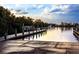 Boat ramp with access to calm waters and a bridge in the distance at 3800 Carupano Ct, Punta Gorda, FL 33950