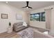 Sitting room with view of a pool and a ceiling fan at 3800 Carupano Ct, Punta Gorda, FL 33950