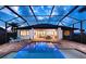 Inviting pool with a spacious deck, ideal for outdoor gatherings and enjoying the serene surroundings at 3800 Carupano Ct, Punta Gorda, FL 33950
