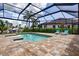 Beautiful screened-in pool with inviting lounge chairs, perfect for enjoying the Florida sunshine at 3800 Carupano Ct, Punta Gorda, FL 33950
