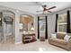 Comfortable living room featuring neutral decor, a large window, and plenty of natural light at 4180 Lenox Blvd, Venice, FL 34293