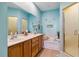 Bathroom with a double sink vanity, a shower and a garden tub at 4567 Whispering Oaks Dr, North Port, FL 34287