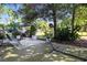 Backyard patio with grill and greenery at 5052 Kingsley Rd, North Port, FL 34287
