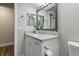 Updated bathroom vanity featuring granite countertops and modern fixtures create an appealing and fresh aesthetic at 5052 Kingsley Rd, North Port, FL 34287