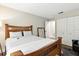 Comfortable bedroom featuring a spacious bed, large closet, and soft rug, perfect for relaxation and storage at 5052 Kingsley Rd, North Port, FL 34287