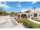 Serenade community sign with lush landscaping, gated entrance, and blue skies at 5146 Northridge Rd # 305, Sarasota, FL 34238
