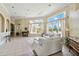 Bright and airy living room with comfortable seating, large windows, and elegant décor; a perfect relaxation space at 5146 Northridge Rd # 305, Sarasota, FL 34238