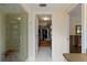 Bright bathroom featuring a walk-in shower and doorway to walk-in closet at 5230 Lake Arrowhead Trl # 29, Sarasota, FL 34231