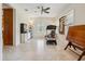 Large bonus room with an open floor plan, a treadmill, and natural light at 5242 Blackjack Cir, Punta Gorda, FL 33982
