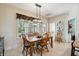 Comfortable dining room with bright natural light and seating for six at 5242 Blackjack Cir, Punta Gorda, FL 33982
