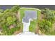 A high angle view of the home and surrounding landscaping at 576 Mcdill Dr, Port Charlotte, FL 33953