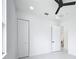 Clean bedroom space featuring a closet, connecting door and neutral colors that bring out the natural light at 576 Mcdill Dr, Port Charlotte, FL 33953