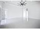 Bright, open-concept living room with recessed lighting, a ceiling fan, and a neutral color palette at 576 Mcdill Dr, Port Charlotte, FL 33953