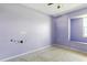 Bedroom featuring a window offering abundant natural light at 6196 Mayberry Ave, North Port, FL 34287
