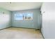 Bedroom featuring a window offering abundant natural light at 6196 Mayberry Ave, North Port, FL 34287
