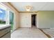 Dining space with sliding glass doors and adjacent kitchen area at 6196 Mayberry Ave, North Port, FL 34287