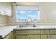 Kitchen sink with a view to the outside, showing off the natural light at 6196 Mayberry Ave, North Port, FL 34287