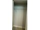 Walk-in closet offering modern shelving and ample storage space for clothing and personal items at 7052 Legion St, Port Charlotte, FL 33981