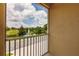 Enjoy the scenic view of a fountain and pond from this screened-in balcony at 8098 Moonstone Dr # 17-203, Sarasota, FL 34233