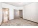 Bedroom with doors leading to the bathroom and closet providing easy accessibility to all areas at 8098 Moonstone Dr # 17-203, Sarasota, FL 34233