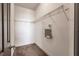 Walk-in closet featuring ample shelving providing an organized storage solution for clothes and accessories at 8098 Moonstone Dr # 17-203, Sarasota, FL 34233
