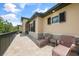 Relaxing balcony with stone accents, stylish furniture, and serene outdoor views for enjoying leisure time at 8312 Acorn Blvd, Punta Gorda, FL 33982