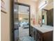 The bathroom's quartz counters and modern fixtures offer a clean, refreshing look at 8312 Acorn Blvd, Punta Gorda, FL 33982