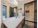 The bathroom's quartz counters and modern fixtures offer a clean, refreshing look at 8312 Acorn Blvd, Punta Gorda, FL 33982