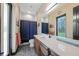 This bathroom has quartz countertops, ample counter space, and modern fixtures at 8312 Acorn Blvd, Punta Gorda, FL 33982