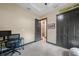Bedroom with a gray beanbag, desk, chair, and large closet space at 8312 Acorn Blvd, Punta Gorda, FL 33982