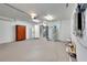 Spacious garage with ample storage and utility connections at 875 Bayshore Dr, Englewood, FL 34223