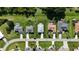 Aerial view showcases well-maintained homes, lush landscaping, and neighborhood streets at 96 Mocha Ct, Punta Gorda, FL 33983