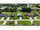 Aerial view of homes, showcasing manicured lawns and neighborhood layout at 96 Mocha Ct, Punta Gorda, FL 33983