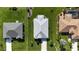 Birds-eye view of a charming single-story home with a well-manicured lawn and a pristine gray roof at 96 Mocha Ct, Punta Gorda, FL 33983