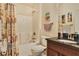 Full bathroom featuring a shower and tub combination and decorative shower curtain at 96 Mocha Ct, Punta Gorda, FL 33983