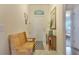 Welcoming entryway features a wooden bench, neutral walls, and tiled flooring at 96 Mocha Ct, Punta Gorda, FL 33983