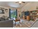 Bright and airy living room with French doors and stylish furnishings at 96 Mocha Ct, Punta Gorda, FL 33983