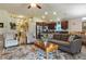 Open concept living area with a large rug and stainless steel kitchen appliances at 96 Mocha Ct, Punta Gorda, FL 33983