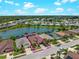 Wonderful waterfront property with serene lake views and lush greenery surrounding this desirable neighborhood at 10131 Winding River Rd, Punta Gorda, FL 33950