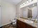 Bathroom with granite countertops and tiled shower at 10131 Winding River Rd, Punta Gorda, FL 33950