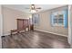 Bedroom with natural light, wood floors, and neutral wall color at 10131 Winding River Rd, Punta Gorda, FL 33950