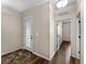 Welcoming entryway with hardwood floors, decorative door, and access to the rest of the home at 10131 Winding River Rd, Punta Gorda, FL 33950