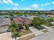 Beautiful single-Gathering home with well-manicured lawn, mature trees, and long driveway situated in a tranquil neighborhood at 10131 Winding River Rd, Punta Gorda, FL 33950