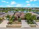 Charming single-Gathering home with a beautiful lake view, well-maintained landscaping, and a cozy, inviting front yard at 10131 Winding River Rd, Punta Gorda, FL 33950