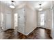 Hallway featuring a decorative tile floor and neutral walls at 10131 Winding River Rd, Punta Gorda, FL 33950