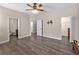 Spacious main bedroom featuring wood floors and ensuite bathroom at 10131 Winding River Rd, Punta Gorda, FL 33950