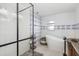 Bathroom showcasing modern freestanding tub, glass enclosed shower and decorative wall tile at 123 Annapolis Ln, Rotonda West, FL 33947