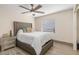Cozy bedroom featuring a tufted headboard bed and a serene atmosphere at 123 Annapolis Ln, Rotonda West, FL 33947