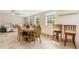 Dining room with an elegant dining table and seating, complemented by neutral decor at 123 Annapolis Ln, Rotonda West, FL 33947